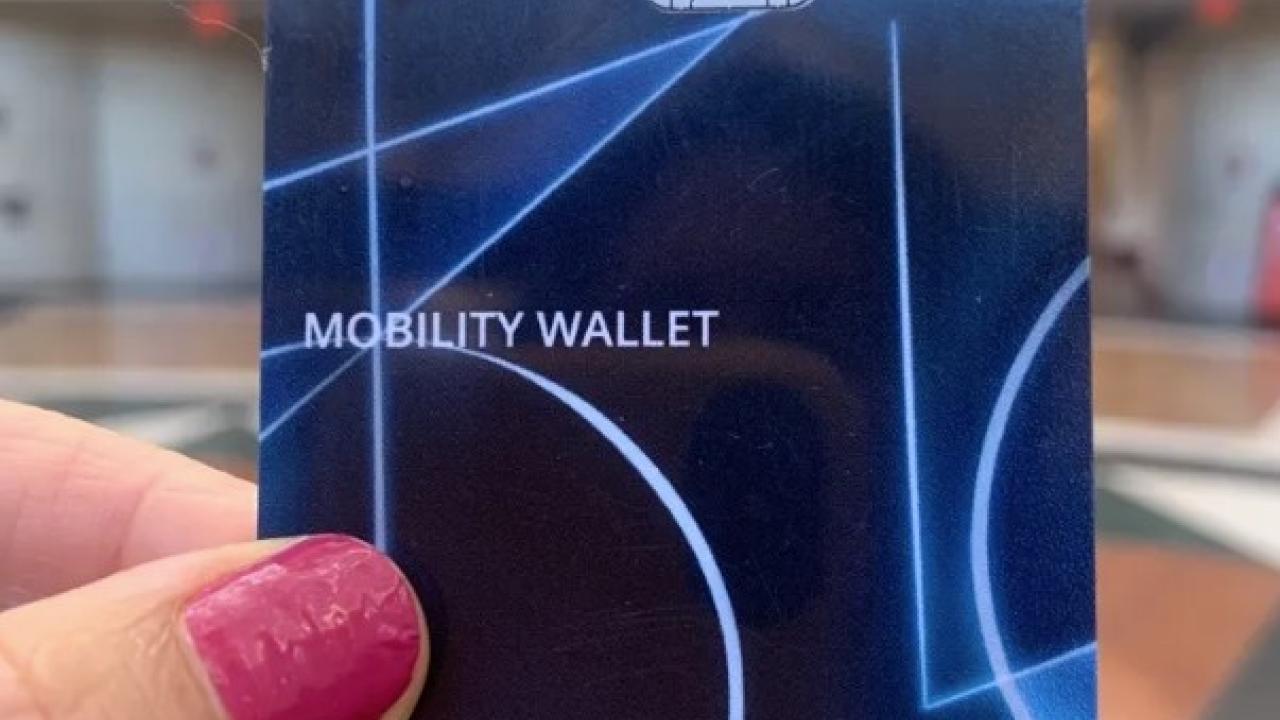 Picture of blue VISA debit card that has the words Mobility Wallet imprinted